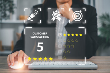 Professional woman using digital tools to evaluate customer satisfaction with a five-star rating system in a contemporary office environment.