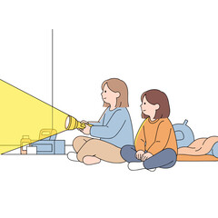 Two children playing with a flashlight indoors at nighttime  