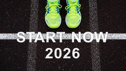 Feet standing on a racing track with start now 2026 written on it