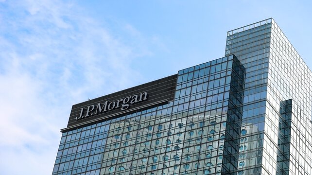 Chater House, Central, Hong Kong- 25 Dec 2025: J.P. Morgan logo sign on the exterior facade of the skyscrapers in Hong Kong with blue sky