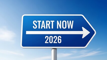 Directional sign indicating start of new year 2026 against clear blue sky