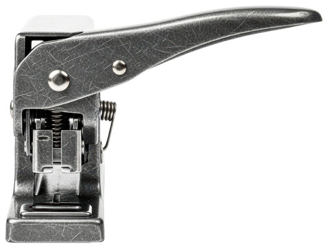 Metal handheld slot puncher for identification cards isolated on transparent background