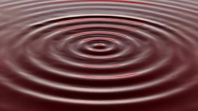 Crimson ripples forming concentric waves on dark mirror, macro aerial zoom 4K