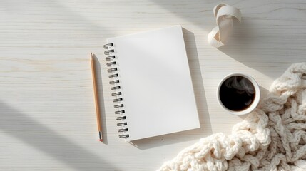 A Moment of Creative Contemplation: An open notebook alongside a pencil and a cup of coffee rest invitingly on a wooden surface, suggesting a space of reflection and productivity. 