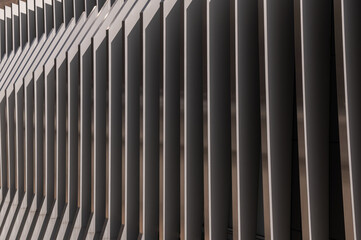 Metal rails on the facade of the building