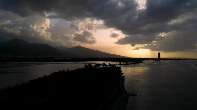 Epic Sunset with Sunbeams and Seagull Over Izmir Lagoon