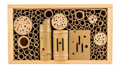 Sustainable and natural insect habitat designed as a wooden box filled with bamboo tubes and perforated wood blocks providing shelter for beneficial pollinators and garden insects