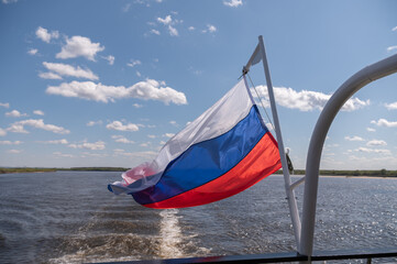 The Russian flag on the stern of the ship
