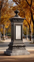 Obraz premium Ornate Bronze Pedestal Monument in Autumn Park