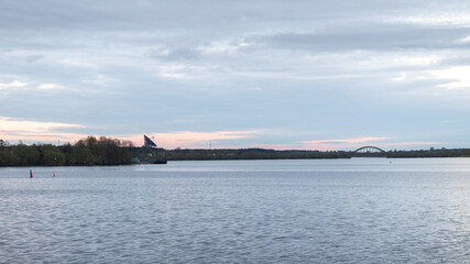 A telescope and a bridge near the river