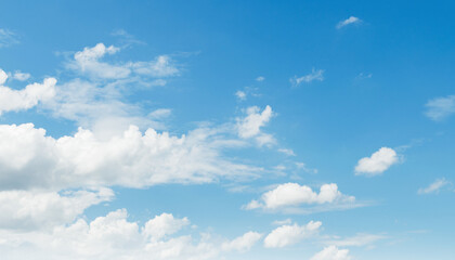 sky is blue and clear with few clouds scattered throughout