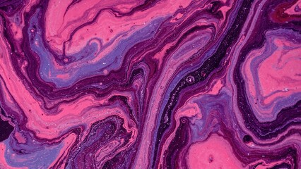 Abstract fluid art with swirling pink, purple, and black marbled patterns.
