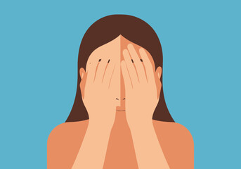 Woman covering her eyes with hands, appearing distressed or shy.
