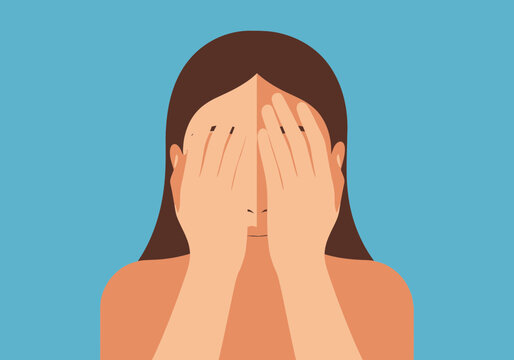 Woman covering her eyes with hands, appearing distressed or shy.