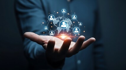 Businessman holding a digital glowing world globe with people network icons representing global communication and international business connection