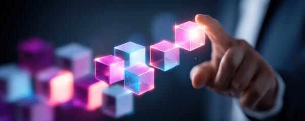 A hand interacts with glowing, colorful cubes in a digital environment, symbolizing technology, innovation, and connectivity.