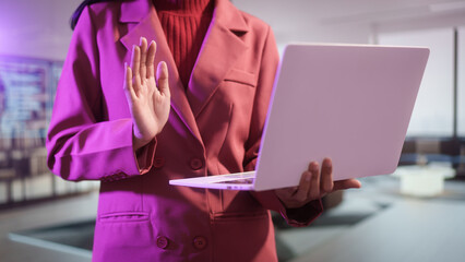 Business professional presenting blank laptop screen in modern office, mockup display for digital content, technology showcase corporate communication workspace background, clean interface copy space