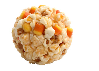 Caramel popcorn ball with candy corn on white background for autumn treats