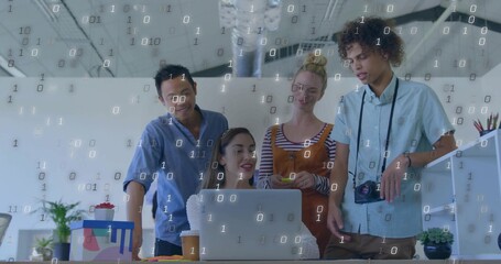 Collaborating team in studio wearing white sweater leaning over laptop, camera, binary overlay