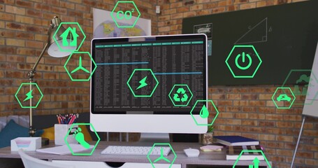 Displaying all-in-one monitor showing terminal text at brick home-office, with neon-green eco icons