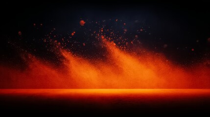Black background with orange powder in the foreground. The powder is in the shape of a flame