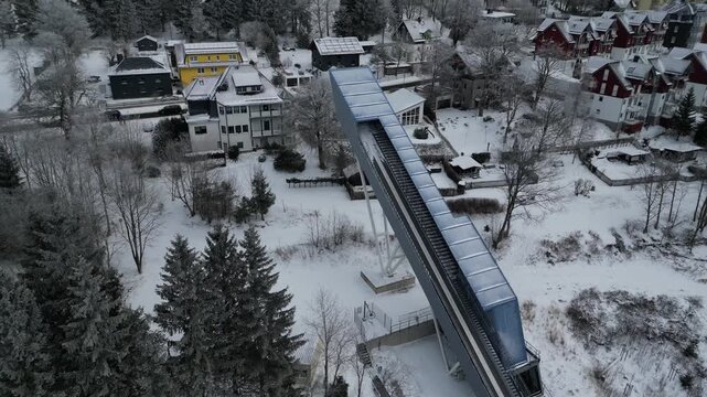 Winter Drone Flight Over Snowy Pine Forest in Thuringian Mountains, Germany, 4K
