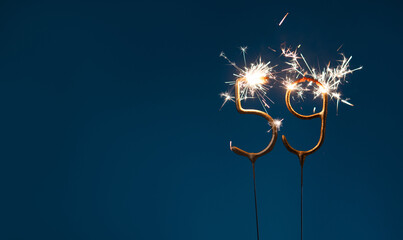 59 years celebration festive background made with Bengal fires in the form of number Fifty nine.
