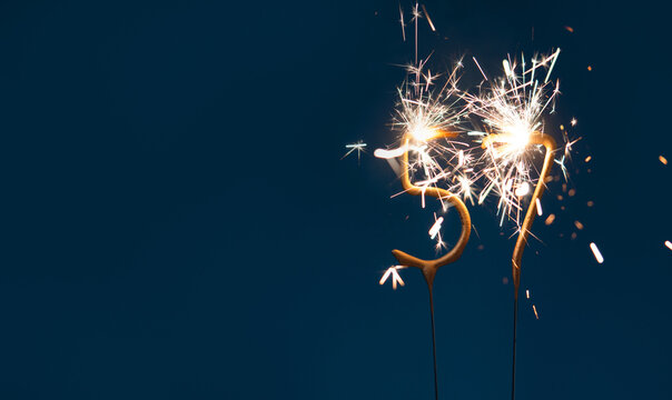 57 years anniversary celebration festive background made with Bengal fires in the form of number Fifty seven.