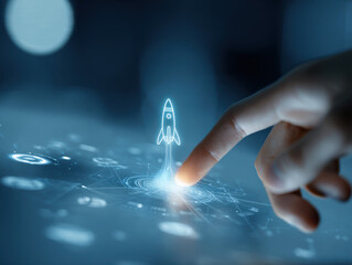 Finger touching a digital interface with a glowing rocket launch icon.