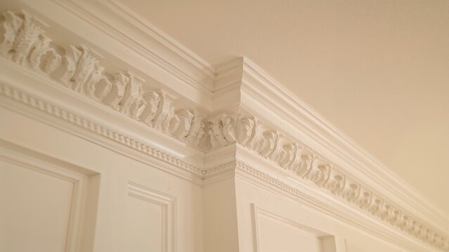 Decorative molding and ceiling detail in interior architecture.