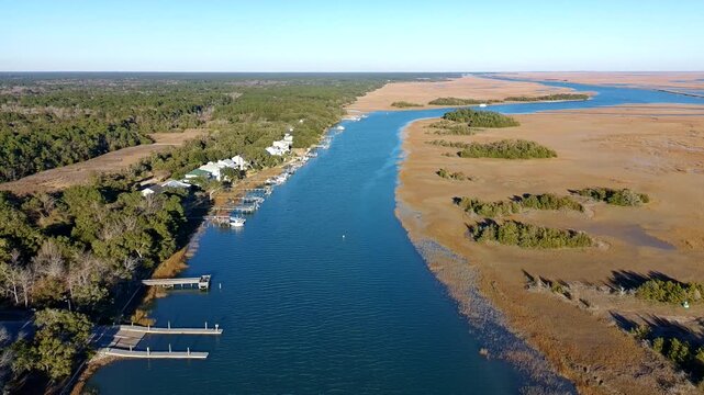 Drone clip of slow ascension over the intercostal waterway in South Carolina just before sunset.