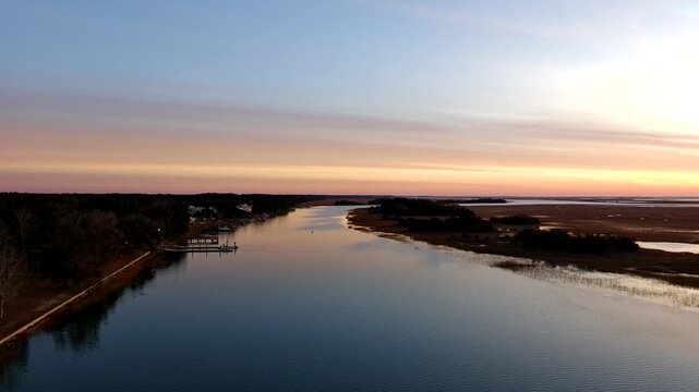 Drone clip of slow ascension over the intercostal waterway in South Carolina just before sunset.