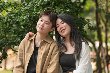 Happy Asian lesbian lgbtq couple dating in love.