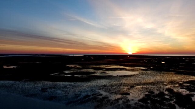 Drone clip of slow ascension over the intercostal waterway in South Carolina just before sunrise.