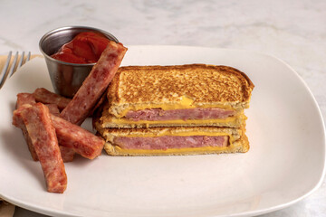 spam melt sandwich served with spam fries