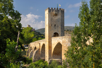 Fototapeta premium Frias medieval bridge tower spanning the river Ebro
