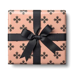 Pink gift box with black ribbon and floral pattern