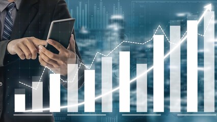 A businessman analyzes financial growth trends using a smartphone, surrounded by digital graphs representing success and future profitability. Copula