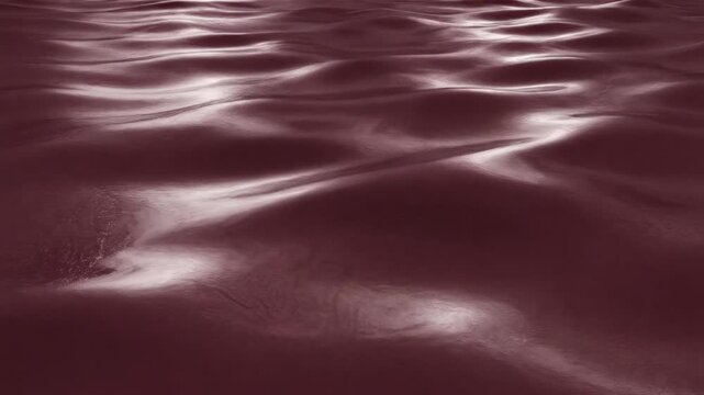 Abstract motion graphic background featuring seamless shimmering waves of deep burgundy patent leather texture emphasizing luxury and success luxury and success, concept, digital