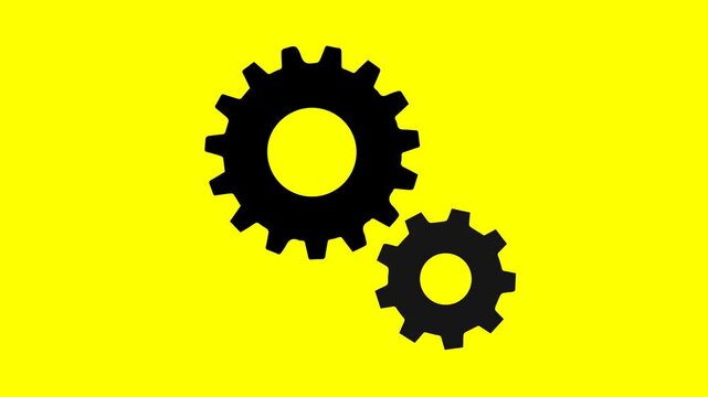 Animated video of black gears and cogs on a yellow background