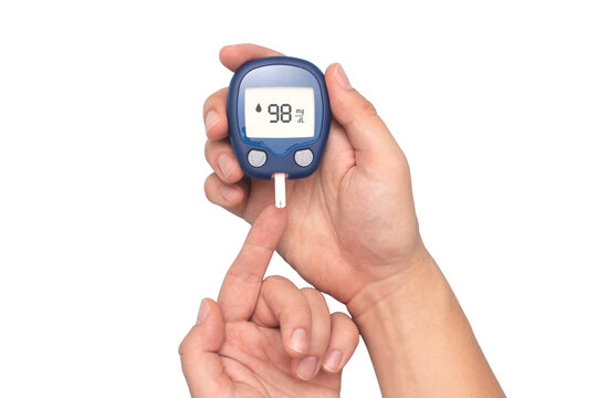 Man using glucometer, checking blood sugar level