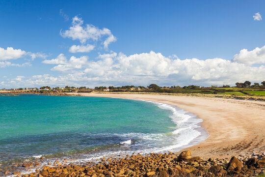 Fermanville beach bay with turquoise water in Normandy, France