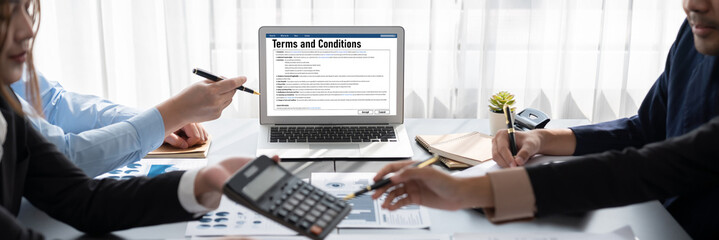 Business intelligence and data analysis concept. Analyst team working on financial data analysis dashboard on laptop screen as marketing indication for effective business strategic planning. Insight