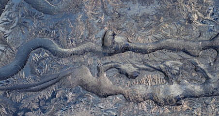 Ice crystals in the detail on a window glass in winter time