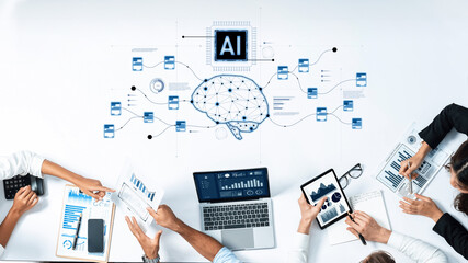 A diverse team of professionals collaborates over an artificial intelligence project, utilizing modern technology and data analysis tools in a bright, engaging office environment. Trope