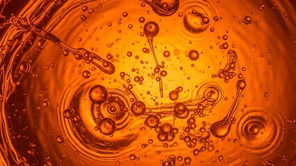 Close-up of fizzy orange drink.