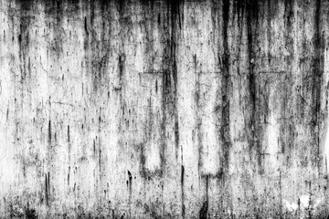 Aged weathered grunge wall texture with black streaks and cracks