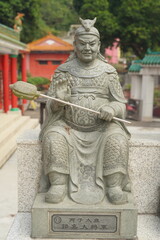 Obraz premium Ten Thousand Buddhas Monastery in Hong Kong. Famous golden statues, red temples, and scenic hillside views. A spiritual landmark and top tourist travel destination.
