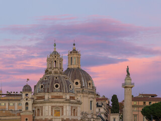 Fototapeta premium Baroque church domes at sunset in Rome