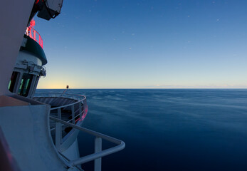 POV View Of The Ship's Bow Under Clear Sky In Motion Sailing Towards Destination Port During Sunrise In The Caribbean Sea